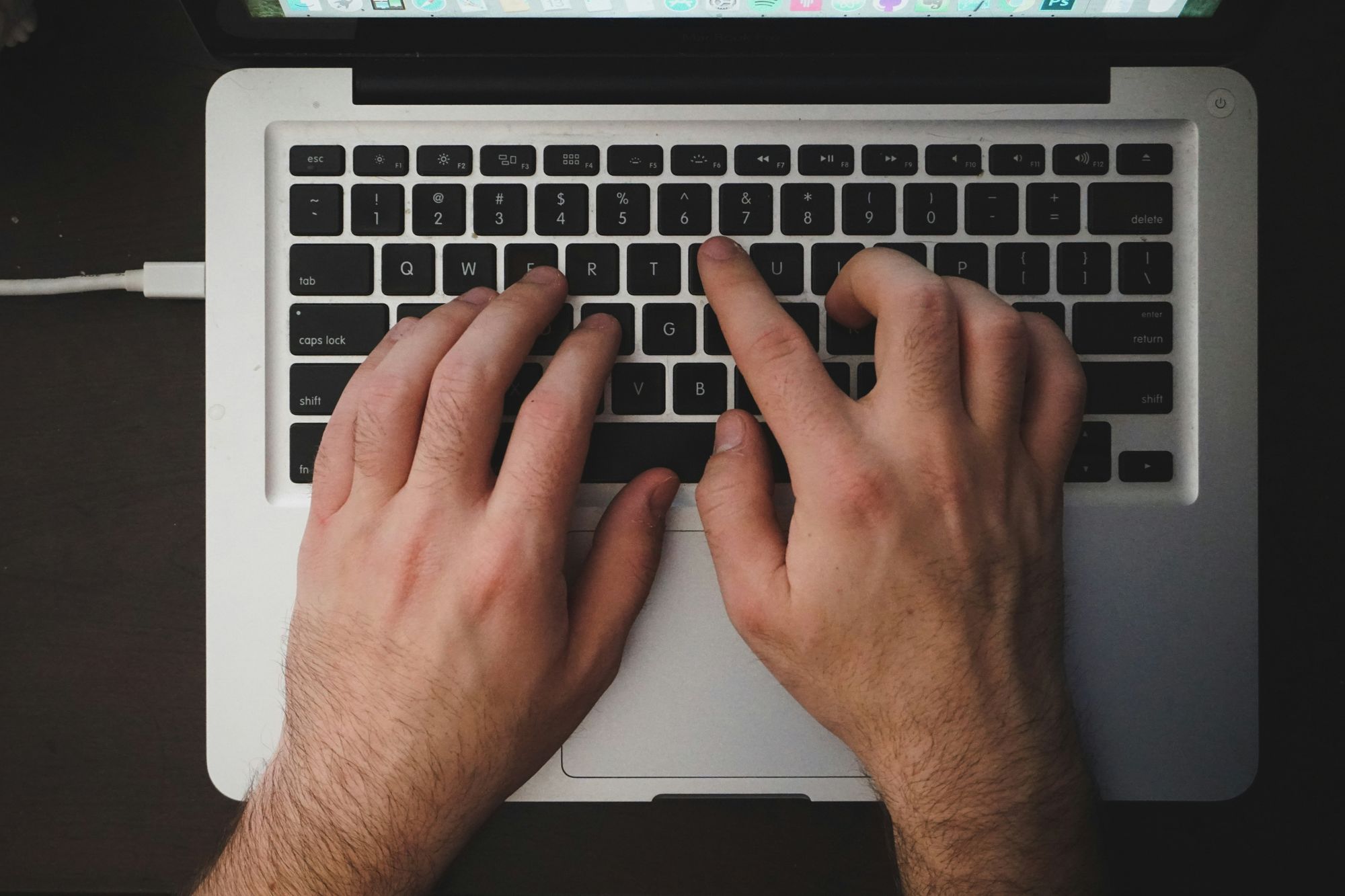 person typing - Wellsaid Labs Pricing